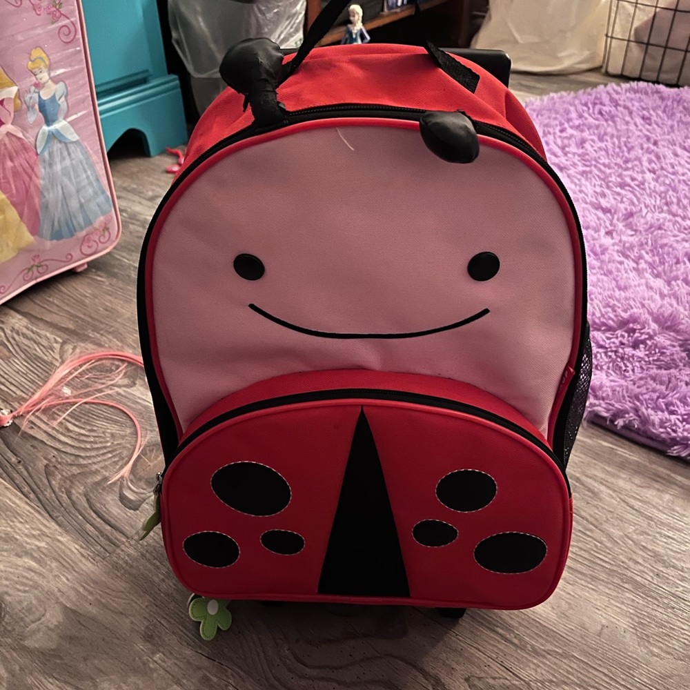 Skip hop ladybug kids luggage.